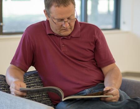 close up of older man reading