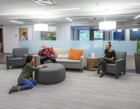 group of young adults hanging out in community space