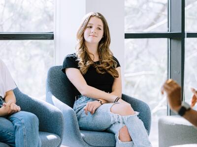 teen in group therapy setting