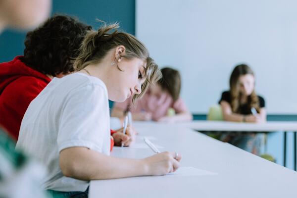 girl doing writing activity