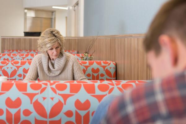 woman sitting in community space